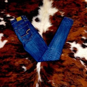 High-rise, ankle-skinny jeans